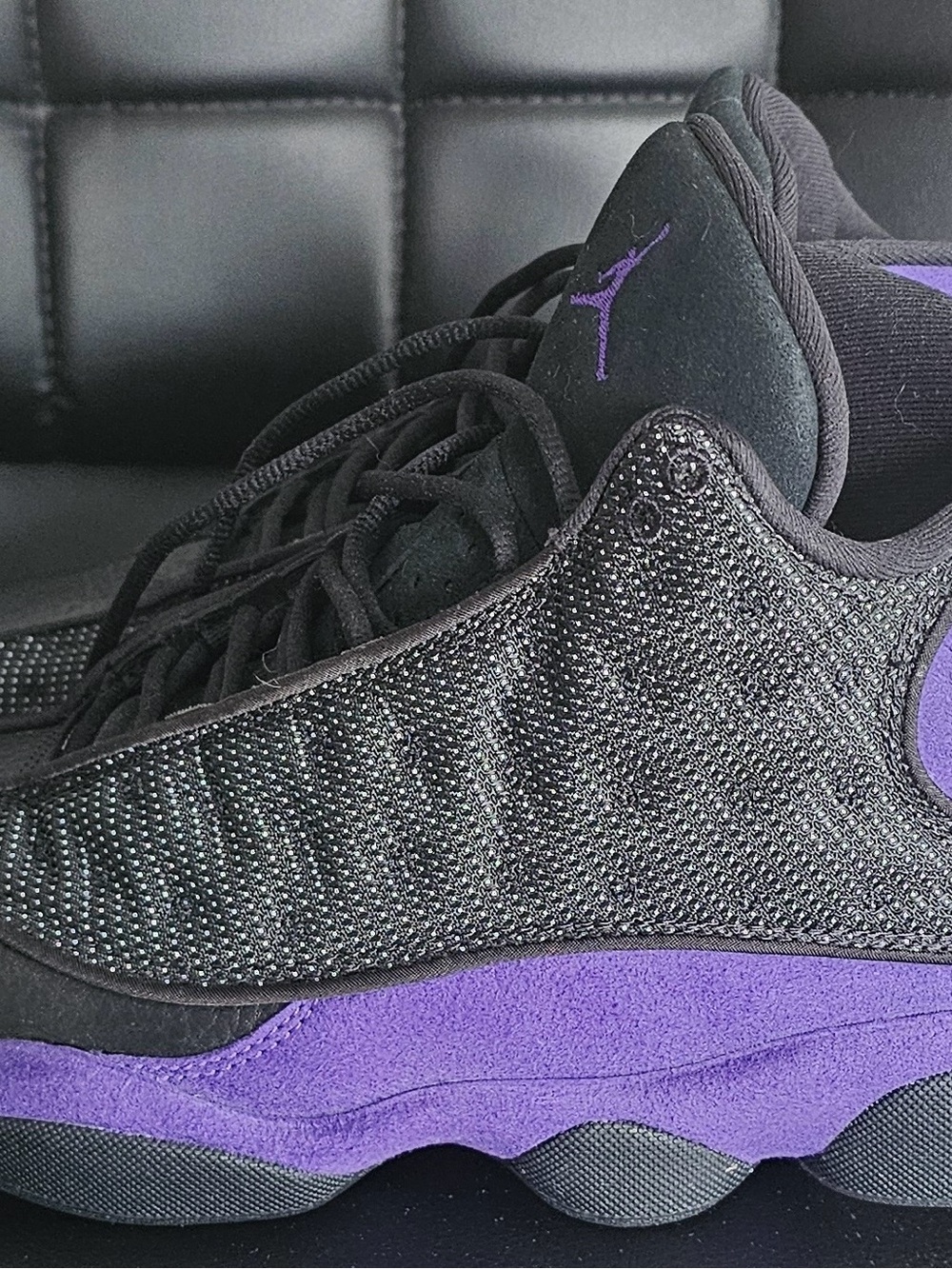Air Jordan 13 Retro black and purple mid-top
